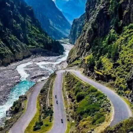 Mountain road alongside the Mandakini River valley on the Kedarnath Yatra route in Uttarakhand