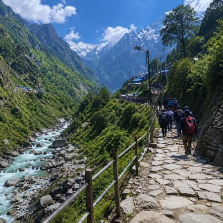Pilgrims walking on the Kedarnath Trek Route near Linchauli alongside the Mandakini Valley during the Kedarnath Tour Package from Rishikesh.