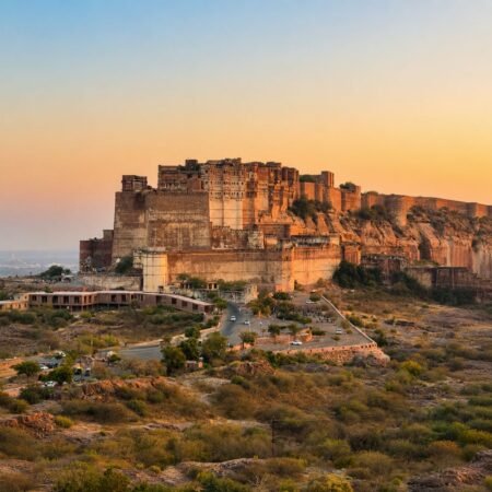 Panoramic view of Mehrangarh Fort in Jodhpur, Rajasthan, overlooking the Blue City during golden hour.