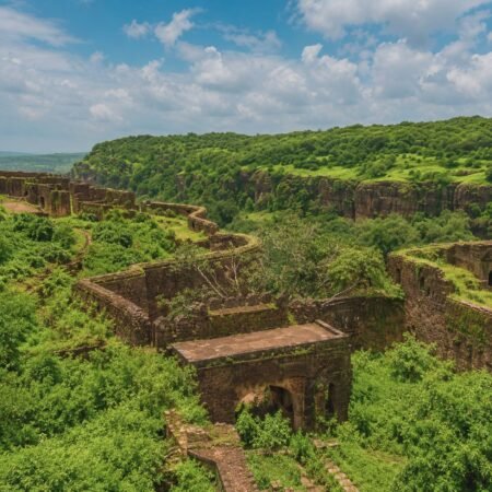 Ancient Raj Bagh Ruins surrounded by lush green forests inside Ranthambore National Park in Sawai Madhopur, Rajasthan.